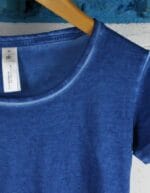 Cucitura denim blu acceso